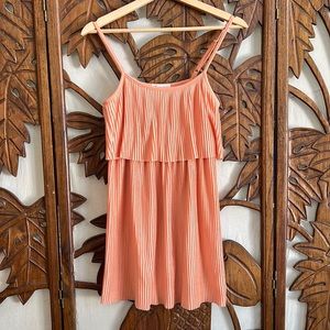 Vintage looking pinkish orange, pleated dress